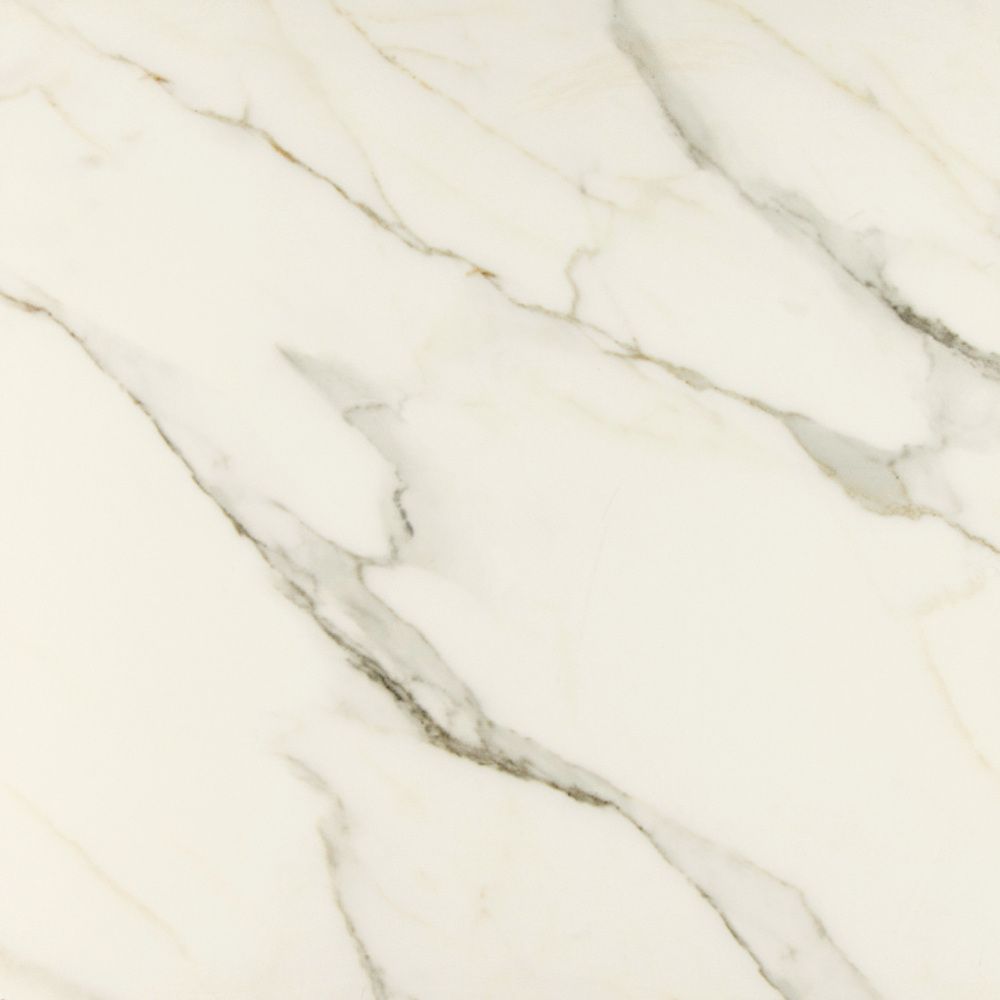 Large-format polished marble look porcelain tile installed in a room, showing white tile with veining across several pieces