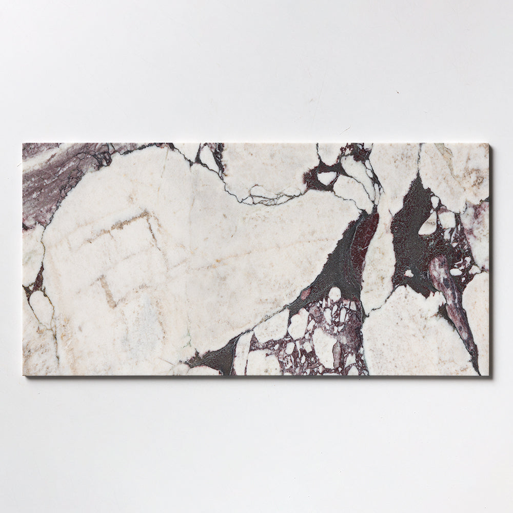 Calacatta Viola marble tile, white with bold burgundy and violet veining