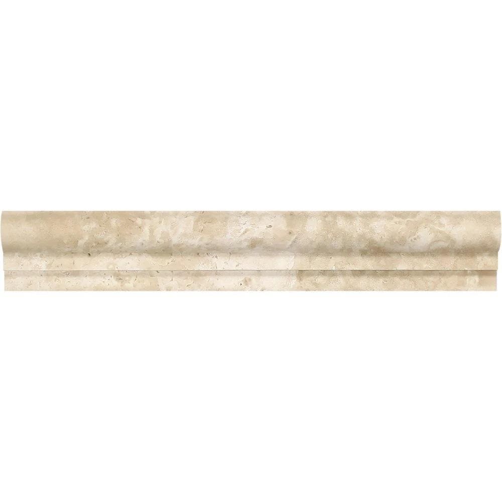 Durango travertine pencil liner and chair rail trims in warm beige-tan