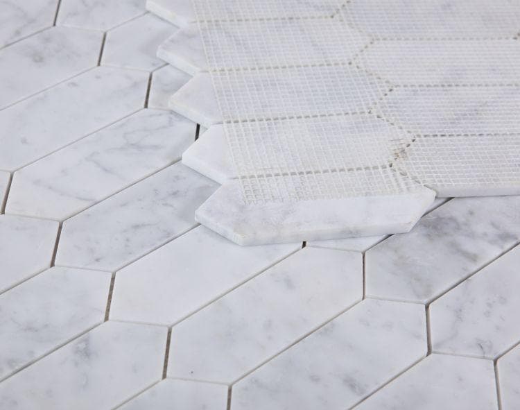 White Carrara marble mosaic in hexagon and herringbone patterns