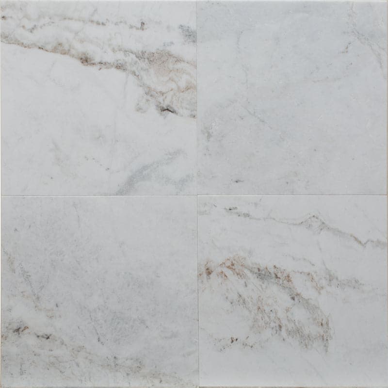 Calacatta Amber marble tile in white with warm amber veining