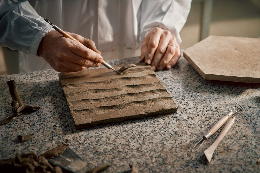 Textured stone tile collection with split-face and 3D dimensional surfaces