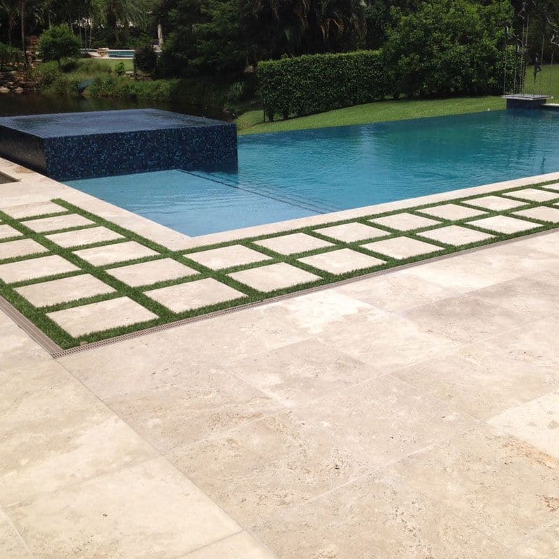  16x16 travertine tile and pavers in warm earth tones