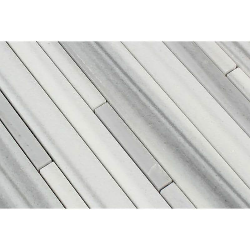 Linear stacked stone and strip mosaic tile in natural stone