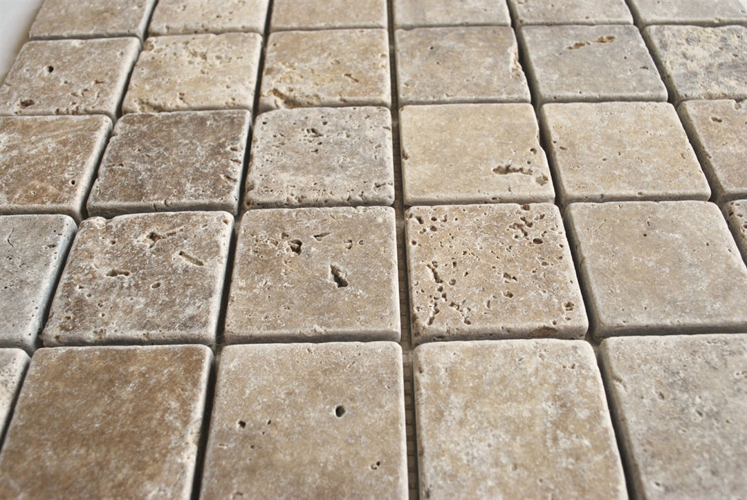 Walnut travertine mosaic tile backsplash