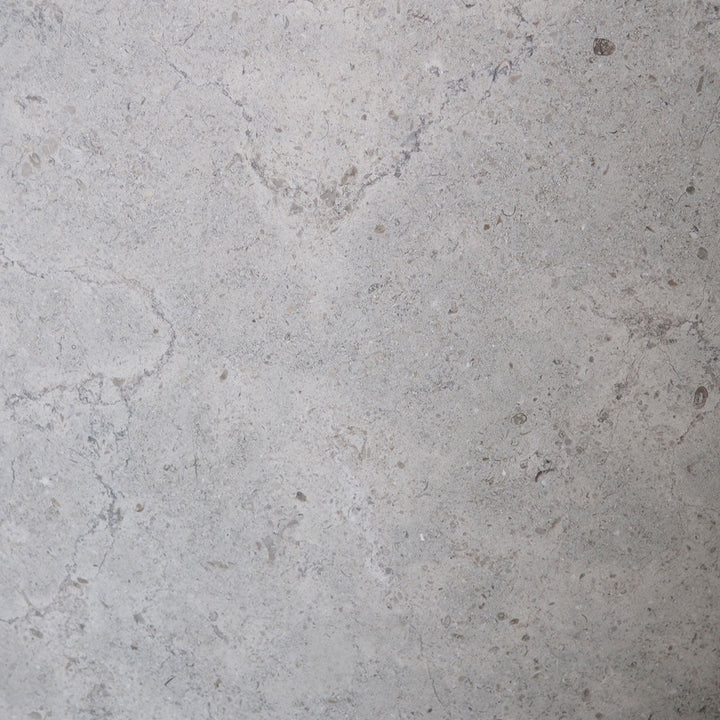 Gascogne Blue Limestone 12x12 honed natural stone tile, showcasing smooth blue-gray surface and subtle texture.