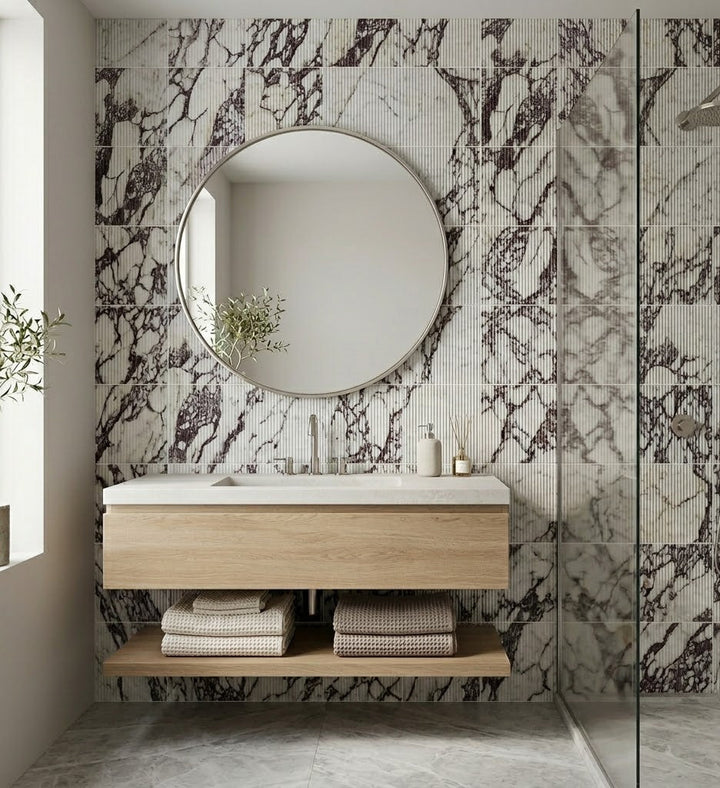 Natural Calacatta Viola marble 12x24 honed fluted tile showing textured vertical grooves and elegant veining.
