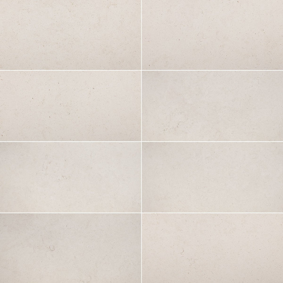 Porto Beige Limestone 18x36 natural stone honed tile from TILE AND MOSAIC DEPOT showing smooth beige surface and rectangular shape.