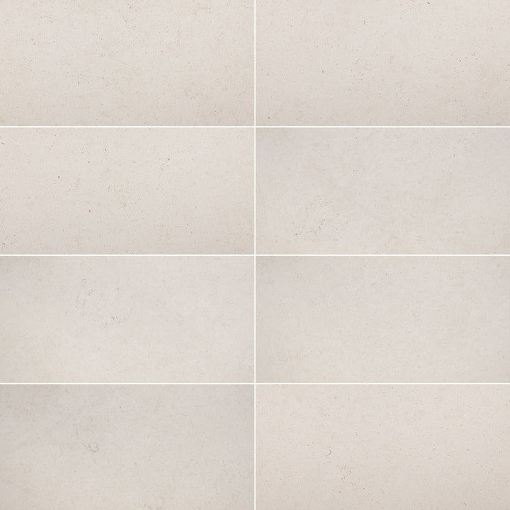 Porto Beige Limestone 18x36 natural stone honed tile from TILE AND MOSAIC DEPOT showing smooth beige surface and rectangular shape.