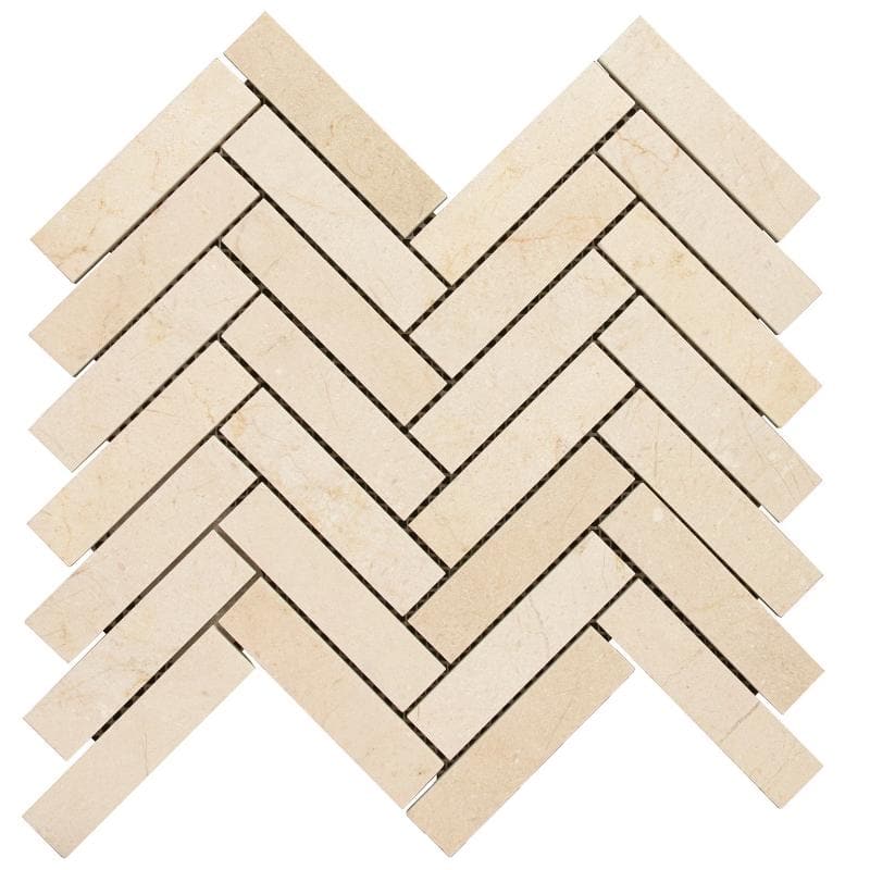Crema Marfil marble 1x4 herringbone polished mosaic tile showing beige marble with a polished finish and intricate herringbone pattern.